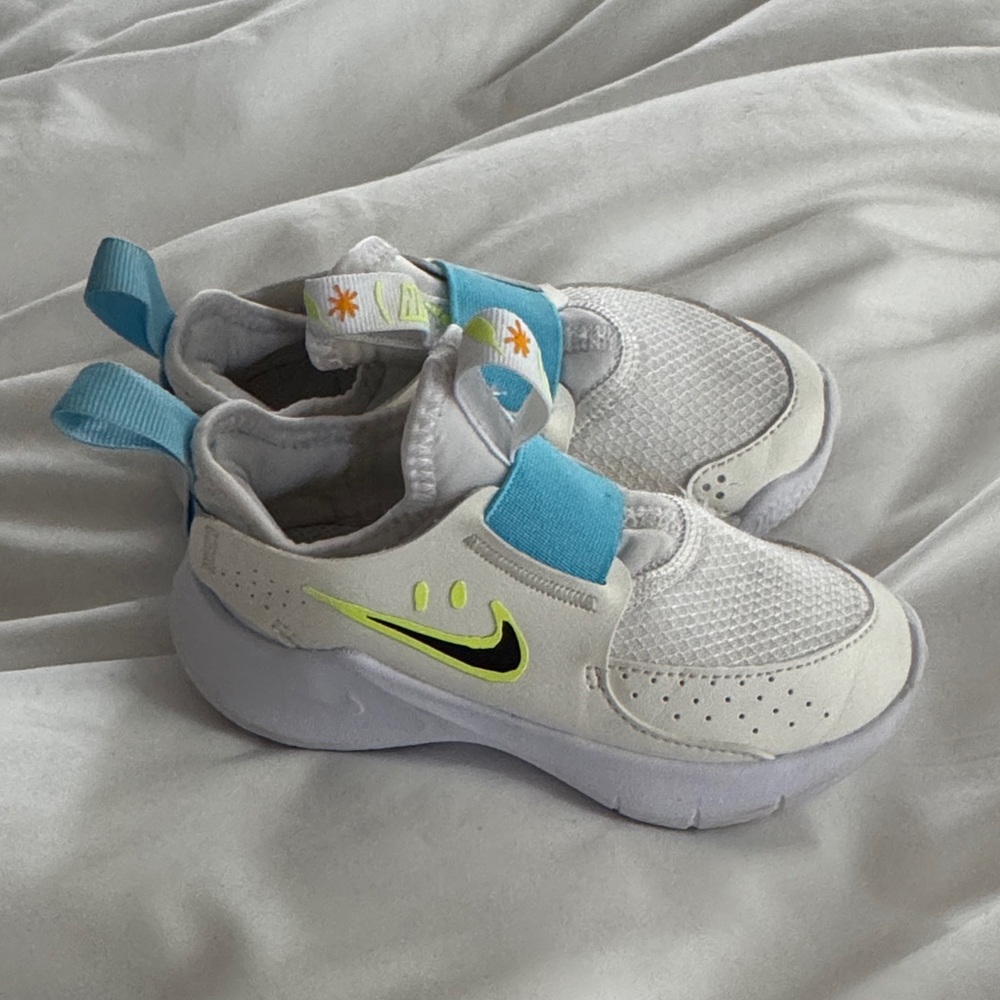 Nike Kids White & Blue Slip-On Sneakers with Neon Yellow Swoosh